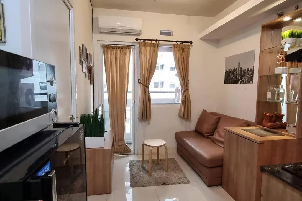 Image of Apt Green Pramuka 2BR Tower B With Wi-Fi and Pool by DEprop