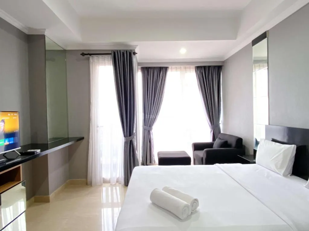 Image of Good Deal and Comfortable Studio Menteng Park Apartment By Travelio