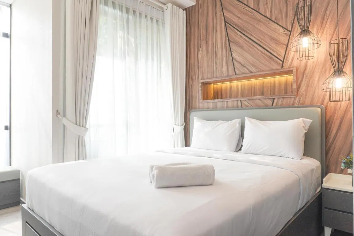 Image of Gorgeous and Comfortable 1BR Sudirman Suites Apartment By Travelio