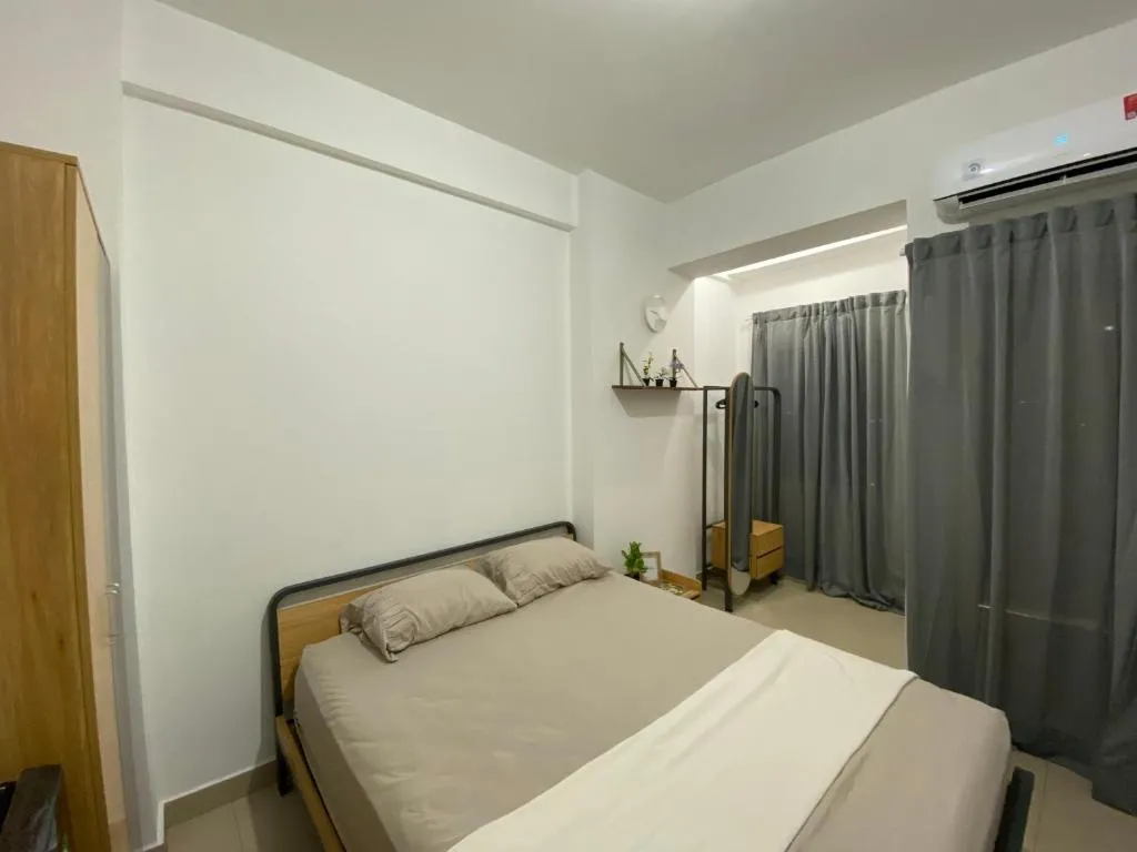Image of Minimalist room at The Nest Apartment by Popobella Near Puri Indah West Jakarta